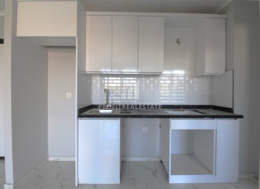 Двухкомнатная квартира, 50м², с собственным садом в комплексе с инфраструктурой в Авсалларе, Алания ID-18060 фото-3
