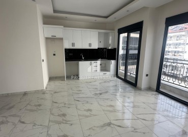 Двухкомнатная квартира без мебели, 49м², в новостройке с широкой инфраструктурой, в 550 метрах от моря, в центре Аланьи ID-15794 фото-2