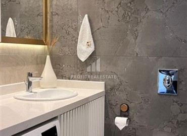 Фешенебельная двухкомнатная квартира, 66,5м², с видом на море в элегантной резиденции на первой береговой линии в районе Алании - Каргыджак ID-18065 фото-10