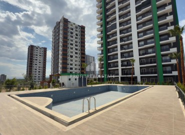 Комфортабельная двухкомнатная квартира, 60м², в резиденции премиум класса в районе Мерсина – Мезитли. ID-18090 фото-1
