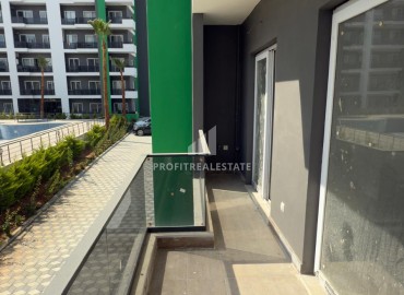 Комфортабельная двухкомнатная квартира, 60м², в резиденции премиум класса в районе Мерсина – Мезитли. ID-18090 фото-13