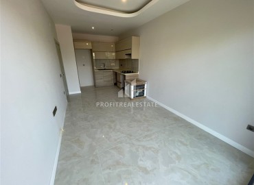 Двухкомнатные апартаменты, 48м², в новостройке с отельной инфраструктурой в 500м от моря в Авсалларе, Алания ID-18093 фото-2