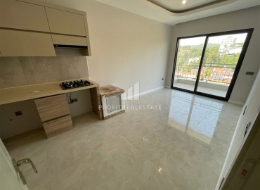 Двухкомнатные апартаменты, 48м², в новостройке с отельной инфраструктурой в 500м от моря в Авсалларе, Алания ID-18093 фото-3
