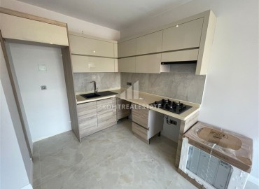 Двухкомнатные апартаменты, 48м², в новостройке с отельной инфраструктурой в 500м от моря в Авсалларе, Алания ID-18093 фото-4