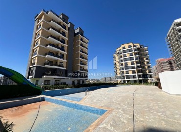 Апартаменты 1+1, 55м², с чистовой отделкой в новом комплексе с зимним бассейном в Аксу, Алтынташ, Анталия ID-18099 фото-11