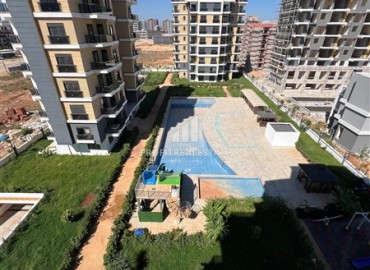 Апартаменты 1+1, 55м², с чистовой отделкой в новом комплексе с зимним бассейном в Аксу, Алтынташ, Анталия ID-18099 фото-12