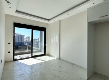 Новые двухкомнатные апартаменты, 55м², с чистовой отделкой в комплексе премиум класса в районе Махмутлар, Алания ID-18106 фото-3