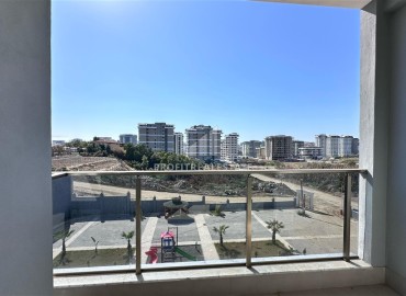Новые двухкомнатные апартаменты, 55м², с чистовой отделкой в комплексе премиум класса в районе Махмутлар, Алания ID-18106 фото-8