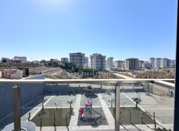 Новые двухкомнатные апартаменты, 55м², с чистовой отделкой в комплексе премиум класса в районе Махмутлар, Алания ID-18106 фото-9