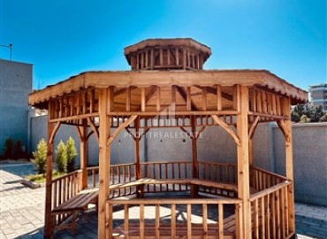 Новые двухкомнатные апартаменты, 55м², с чистовой отделкой в комплексе премиум класса в районе Махмутлар, Алания ID-18106 фото-13