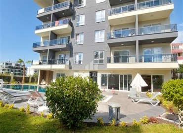 Уютная двухкомнатная квартира, 55м², в комплексе с хорошей инфраструктурой в 300м от моря в Авсалларе, Алания. ID-18107 фото-2