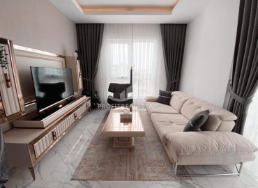 Уютная двухкомнатная квартира, 55м², в комплексе с хорошей инфраструктурой в 300м от моря в Авсалларе, Алания. ID-18107 фото-3