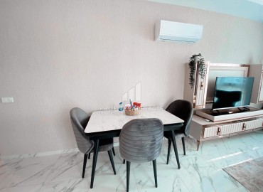 Уютная двухкомнатная квартира, 55м², в комплексе с хорошей инфраструктурой в 300м от моря в Авсалларе, Алания. ID-18107 фото-6