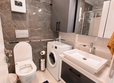 Уютная двухкомнатная квартира, 55м², в комплексе с хорошей инфраструктурой в 300м от моря в Авсалларе, Алания. ID-18107 фото-8
