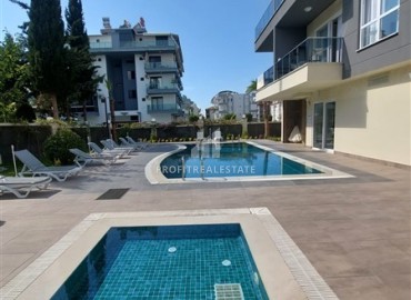 Уютная двухкомнатная квартира, 55м², в комплексе с хорошей инфраструктурой в 300м от моря в Авсалларе, Алания. ID-18107 фото-10