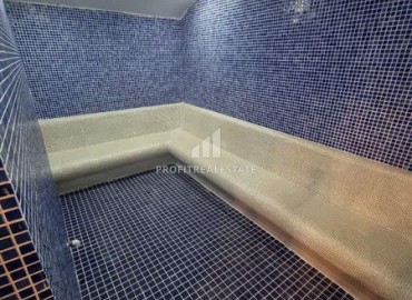 Уютная двухкомнатная квартира, 55м², в комплексе с хорошей инфраструктурой в 300м от моря в Авсалларе, Алания. ID-18107 фото-14