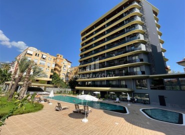 Двухкомнатные апартаменты, 55м², в резиденции премиум класса в центре Алании, в 350м от пляжа Клеопатры ID-18108 фото-1