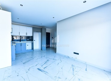 Видовая квартира с одной спальней, 55м², в новом комплексе премиум класса, в 150м от моря в Каргыджаке, Алания ID-18109 фото-3