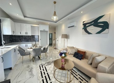 Элегантная квартира 1+1, 55м², в комплексе с зимней инфраструктурой на востоке района Махмутлар, Алания ID-18114 фото-2