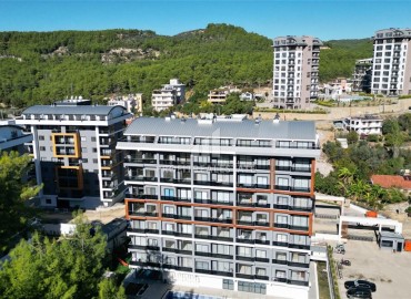 Готовая к проживанию, двухкомнатная квартира, 50м², в новом комплексе премиум класса в районе Авсаллар, Алания ID-18115 фото-1