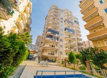 Двухкомнатная квартира, 65м², с мебелью и бытовой техникой, в 300м от моря в Махмутларе, Алания ID-18118 фото-1