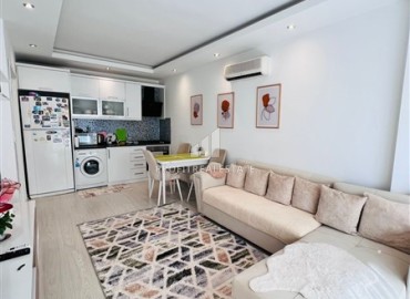 Двухкомнатная квартира, 65м², с мебелью и бытовой техникой, в 300м от моря в Махмутларе, Алания ID-18118 фото-2