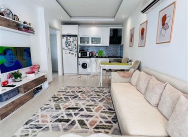 Двухкомнатная квартира, 65м², с мебелью и бытовой техникой, в 300м от моря в Махмутларе, Алания ID-18118 фото-4