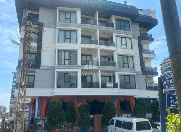 Укомплектованная квартира с одной спальней, 55м² с видом на горы в новом комплексе в Махмутларе, Алания ID-18120 фото-1