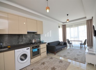 Укомплектованная квартира с одной спальней, 55м² с видом на горы в новом комплексе в Махмутларе, Алания ID-18120 фото-3