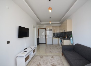 Укомплектованная квартира с одной спальней, 55м² с видом на горы в новом комплексе в Махмутларе, Алания ID-18120 фото-4