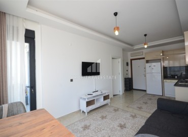 Укомплектованная квартира с одной спальней, 55м² с видом на горы в новом комплексе в Махмутларе, Алания ID-18120 фото-5