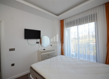 Укомплектованная квартира с одной спальней, 55м² с видом на горы в новом комплексе в Махмутларе, Алания ID-18120 фото-9