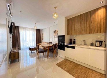 Стильная меблированная квартира с одной спальней, 55м², в новостройке с бассейном у пляжа Клеопатры, Алания ID-18127 фото-7