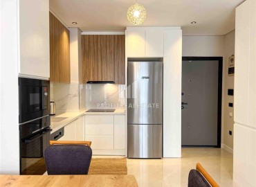 Стильная меблированная квартира с одной спальней, 55м², в новостройке с бассейном у пляжа Клеопатры, Алания ID-18127 фото-14