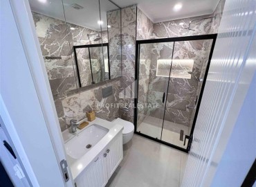 Стильная меблированная квартира с одной спальней, 55м², в новостройке с бассейном у пляжа Клеопатры, Алания ID-18127 фото-17