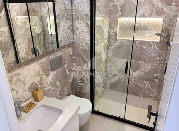 Стильная меблированная квартира с одной спальней, 55м², в новостройке с бассейном у пляжа Клеопатры, Алания ID-18127 фото-18