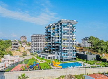 Двухкомнатная квартира, 60м², с видом на море в комплексе с хорошей инфраструктурой в Авсалларе, Алания ID-18133 фото-1