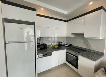 Элегантные двухкомнатные апартаменты, 50м² в комплексе с отельной инфраструктурой в Махмутларе, Алания ID-18134 фото-3