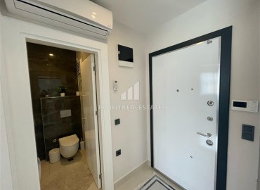 Элегантные двухкомнатные апартаменты, 50м² в комплексе с отельной инфраструктурой в Махмутларе, Алания ID-18134 фото-7