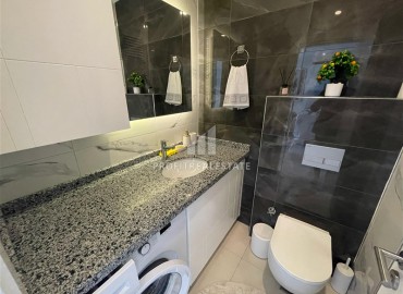 Элегантные двухкомнатные апартаменты, 50м² в комплексе с отельной инфраструктурой в Махмутларе, Алания ID-18134 фото-8