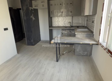 Квартира с одной спальней, 57м², в новой резиденции с бассейном в районе Мерсина – Томюк ID-18139 фото-2
