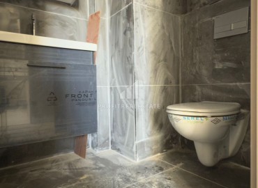 Квартира с одной спальней, 57м², в новой резиденции с бассейном в районе Мерсина – Томюк ID-18139 фото-10