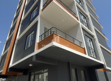 Квартира с одной спальней, 57м², в новой резиденции с бассейном в районе Мерсина – Томюк ID-18139 фото-12