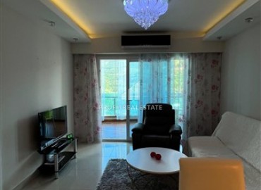 Меблированная квартира с одной спальней, 55м², в элитном комплексе у подножия Торосских гор в Махмутларе ID-18143 фото-3