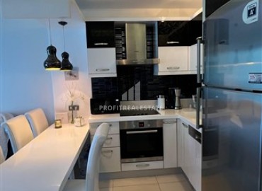 Меблированная квартира с одной спальней, 55м², в элитном комплексе у подножия Торосских гор в Махмутларе ID-18143 фото-6