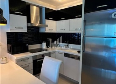 Меблированная квартира с одной спальней, 55м², в элитном комплексе у подножия Торосских гор в Махмутларе ID-18143 фото-7