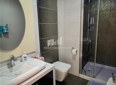 Меблированная квартира с одной спальней, 55м², в элитном комплексе у подножия Торосских гор в Махмутларе ID-18143 фото-10