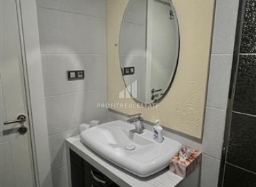 Меблированная квартира с одной спальней, 55м², в элитном комплексе у подножия Торосских гор в Махмутларе ID-18143 фото-12