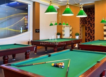 Меблированная квартира с одной спальней, 55м², в элитном комплексе у подножия Торосских гор в Махмутларе ID-18143 фото-19