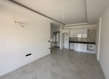 Апартаменты 1+1, 60м², с видом на горы в комфортабельной новостройке в центре Махмутлара, Алания ID-18146 фото-3